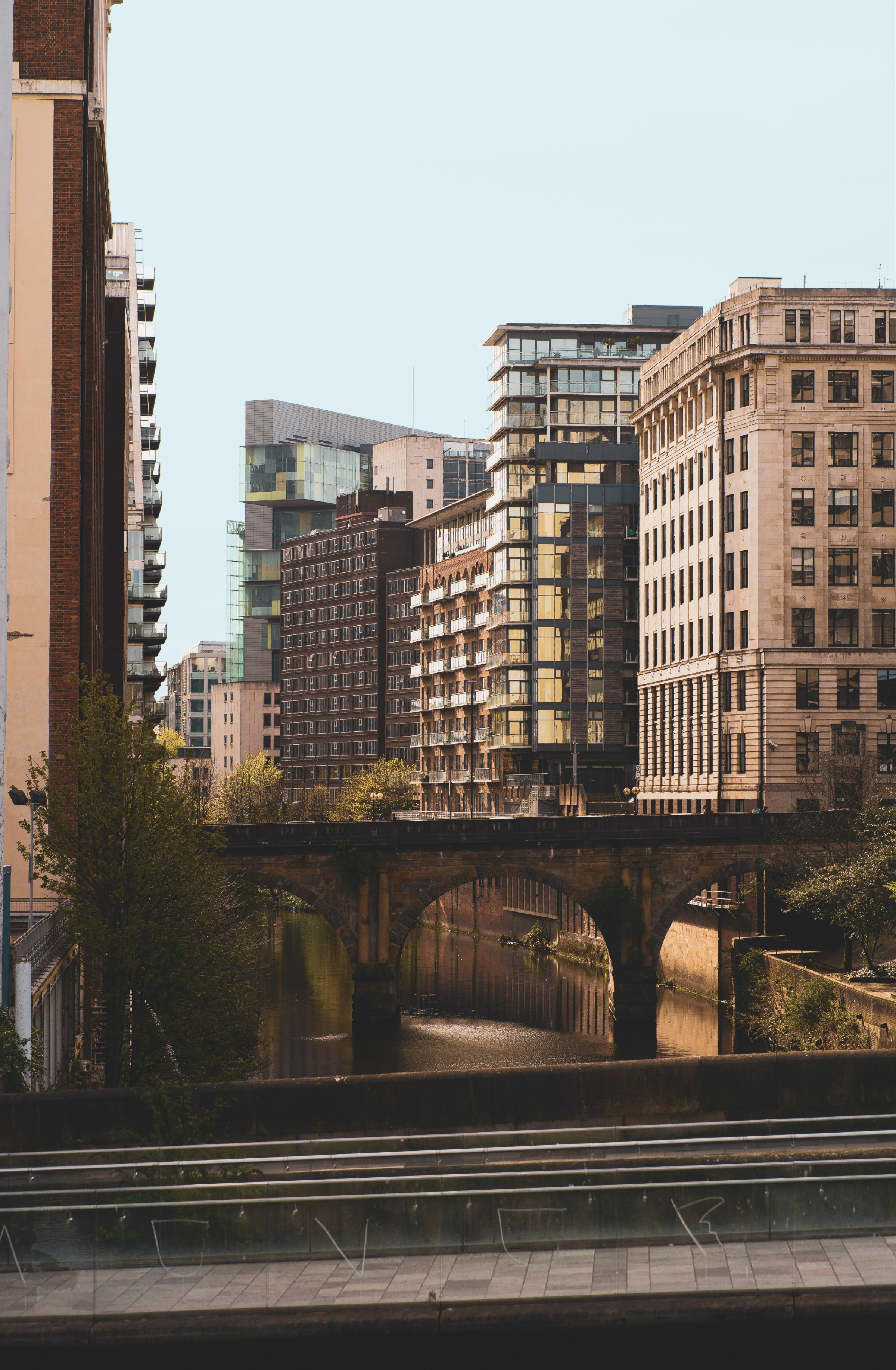 Apartments and offices sitting next to a body of water